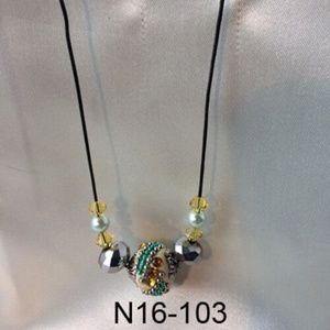 Black corded necklace with yellow and silver beads